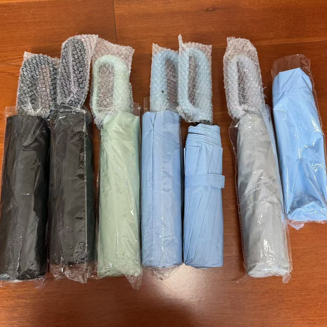 Ring Buckle Handle Folding Umbrella OEM detail photo 1